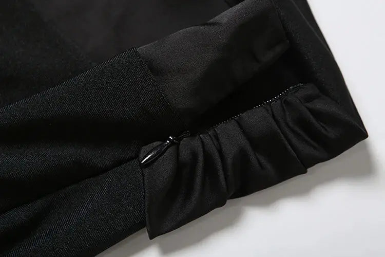 Simples Market kliou cross-pleated black jumpsuit sleeve with ruched cuff and zipper detail