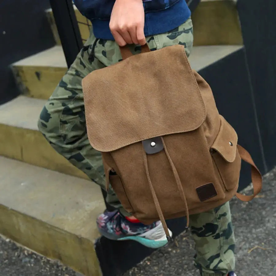 Canvas backpack brown with flap, front pocket, and drawstrings by Simples Market