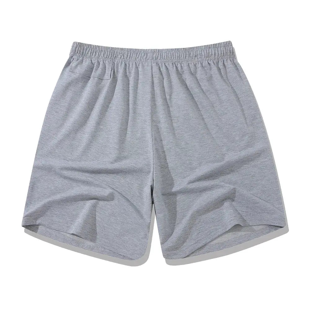 Men's gray gym shorts with elastic waistband and breathable lightweight fabric for workouts and running.