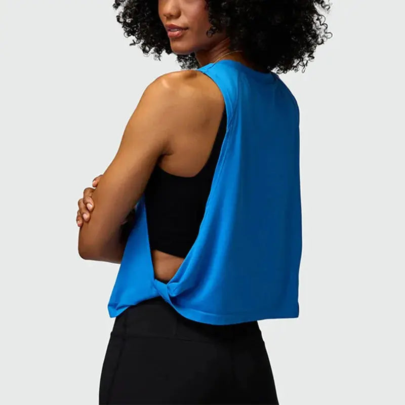 Womens blue running vest crop top, sleeveless yoga tank with twisted back hem by Simples Market