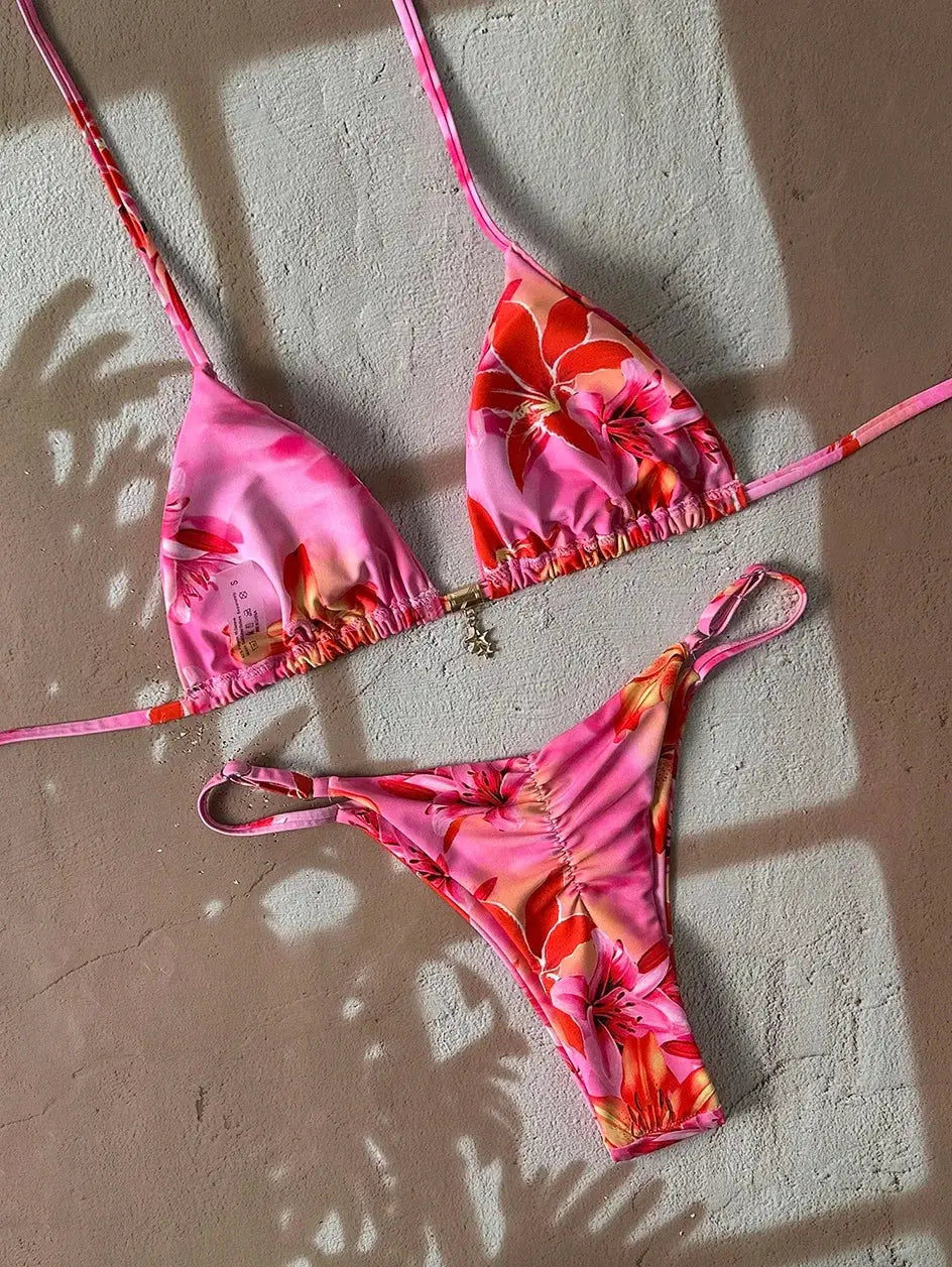 Pink floral two-piece bikini set with triangle top and side-tie bottoms