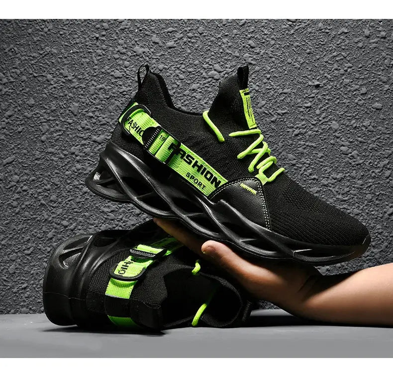Pair of Simples Market black mesh sneakers with neon green laces and thick sculpted sole