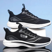 Pair of men's black knit running shoes with gray accents and thick white midsoles