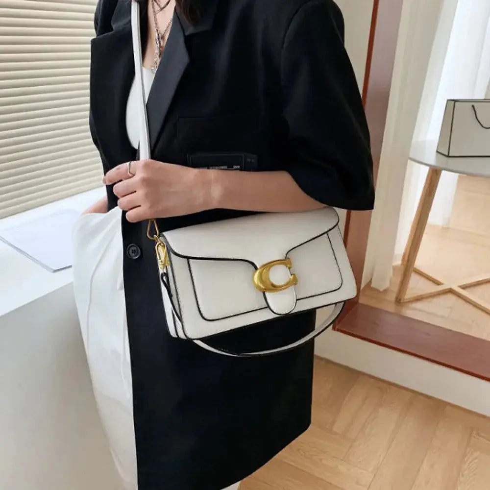 Double-Strap Small Square Crossbody Bag in white with black trim and gold buckle