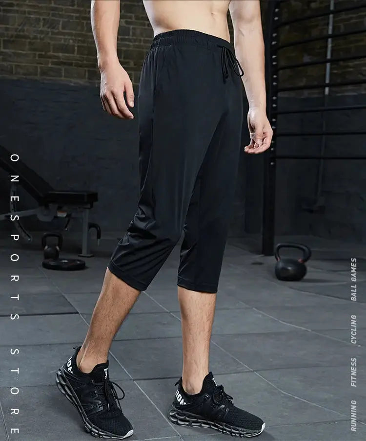 SONECHOKI men's black calf-length running pants with a loose fit and quick-dry fabric