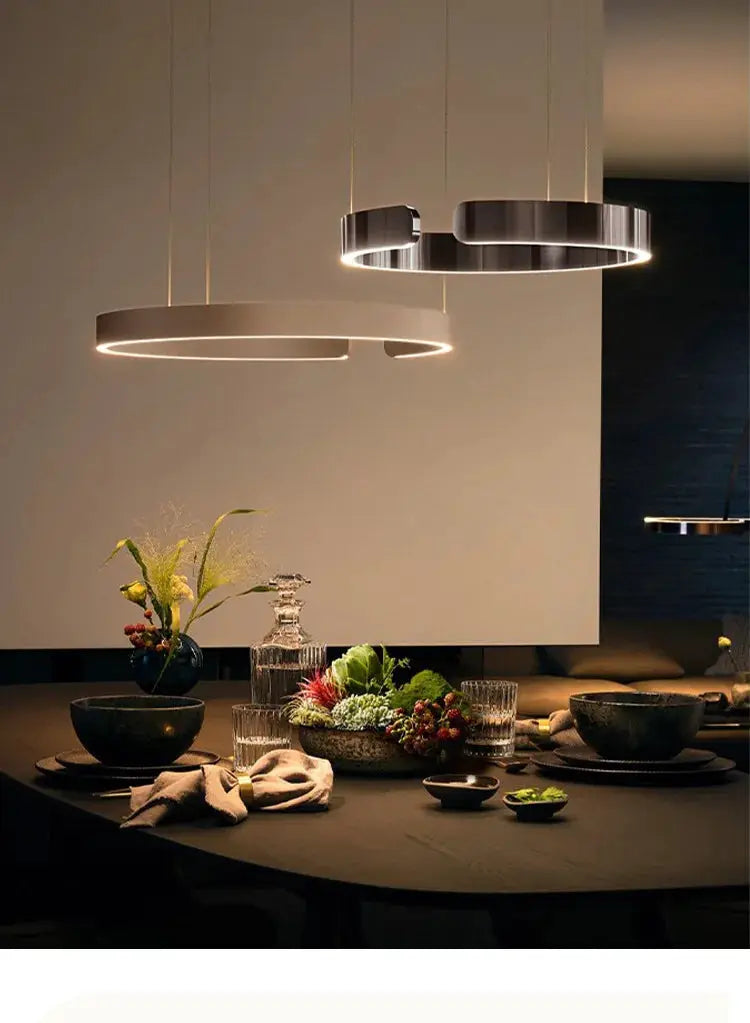 Simples Market modern ring ceiling chandelier with two metallic LED pendant rings over a dining table