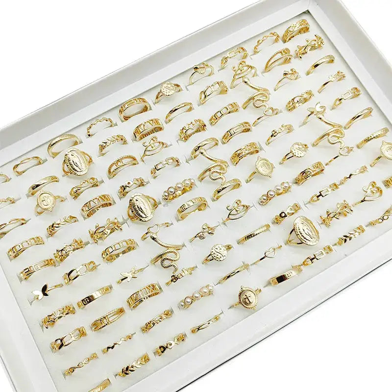 30-piece gold-tone finger ring set for women featuring butterfly, pearl, star and snake designs