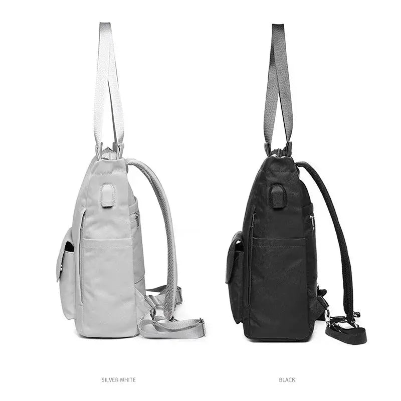 Women’s waterproof laptop backpacks by Simples Market in silver-white and black (2-pack)