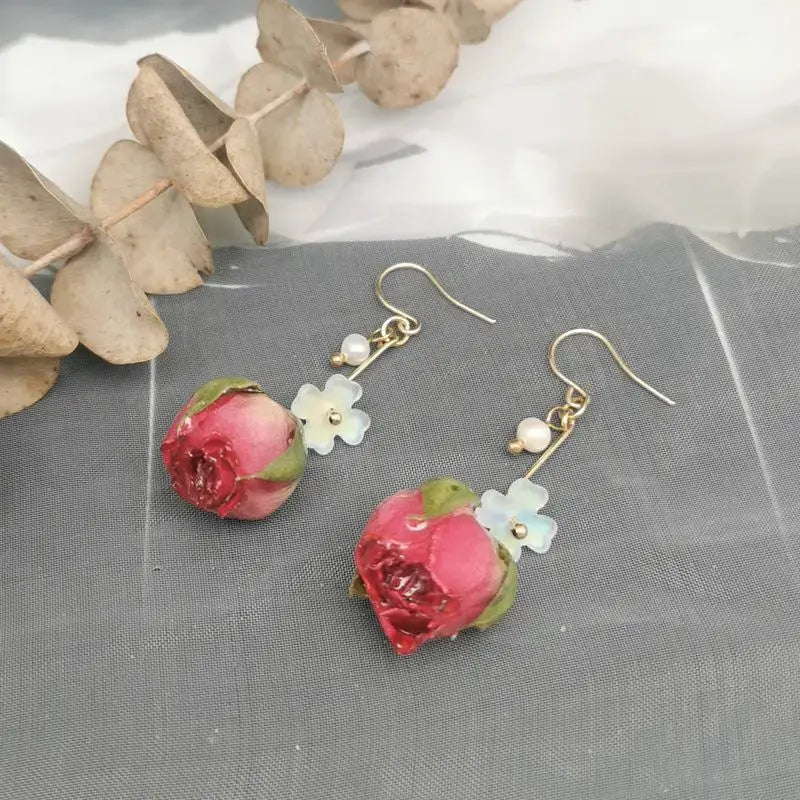 Simples Market red rose epoxy resin drop earrings with pale blue flower charms