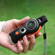 Outdoor camping 7-in-1 survival whistle with compass, black and orange handheld lanyard tool Simples Market