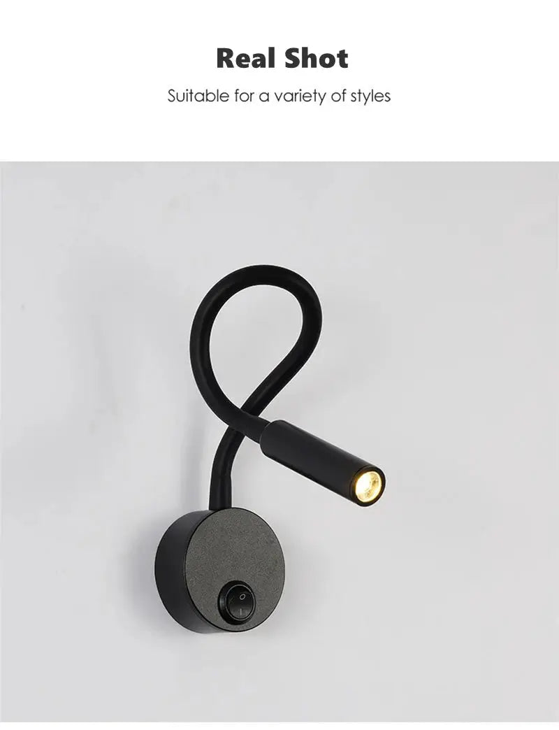 LED flexible gooseneck wall lamp by Simples Market; black wall mount with looped neck and small spotlight