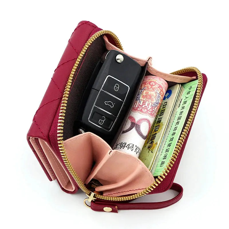 Women's PU tri-fold wallet with zipper; rose-pink exterior and pink interior, multiple card slots and cash pocket.