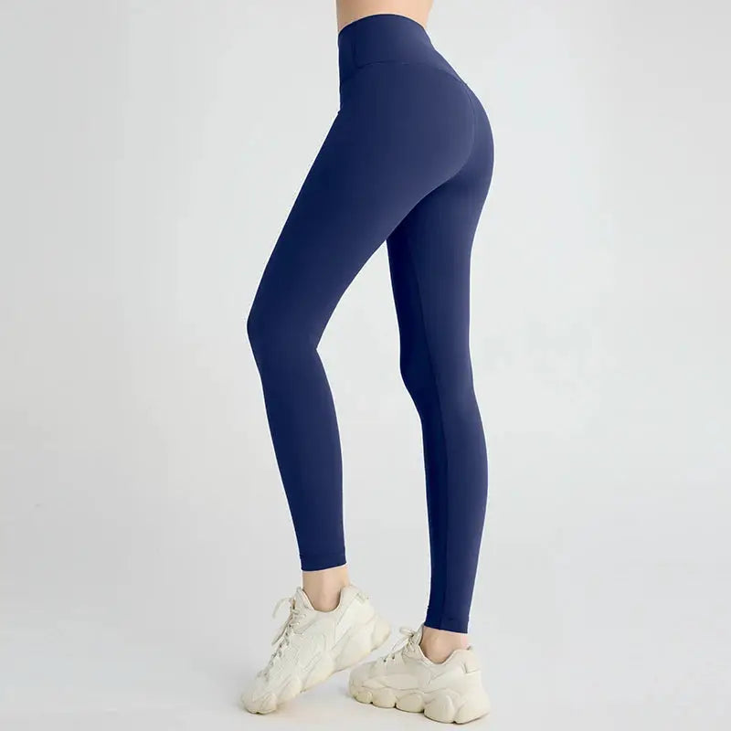 Women's navy high-waisted yoga leggings, hip-lifting fit with breathable fabric