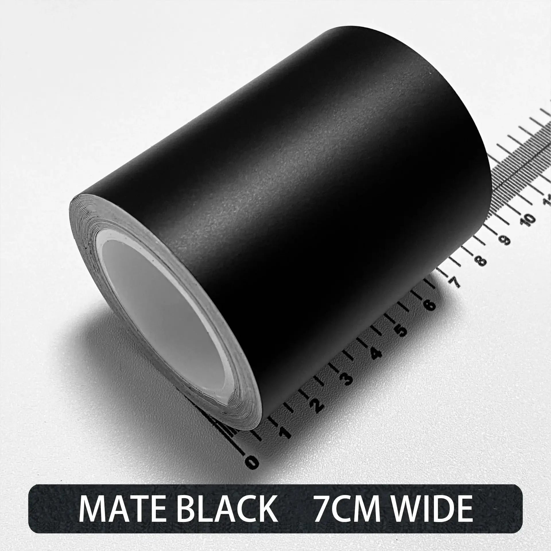 Carbon fiber automotive adhesive tape roll, matte black, 7 cm wide.