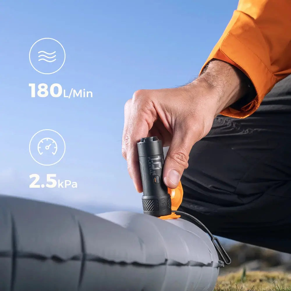 FLEXTAIL ZERO PUMP portable camping air inflator for sleeping pads; black handheld pump with orange base, Simples Market