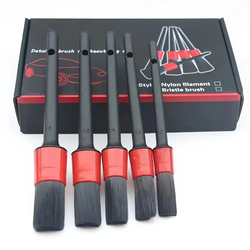 Car detailing brush set by Simples Market; six nylon-bristle brushes with black handles and red collars.