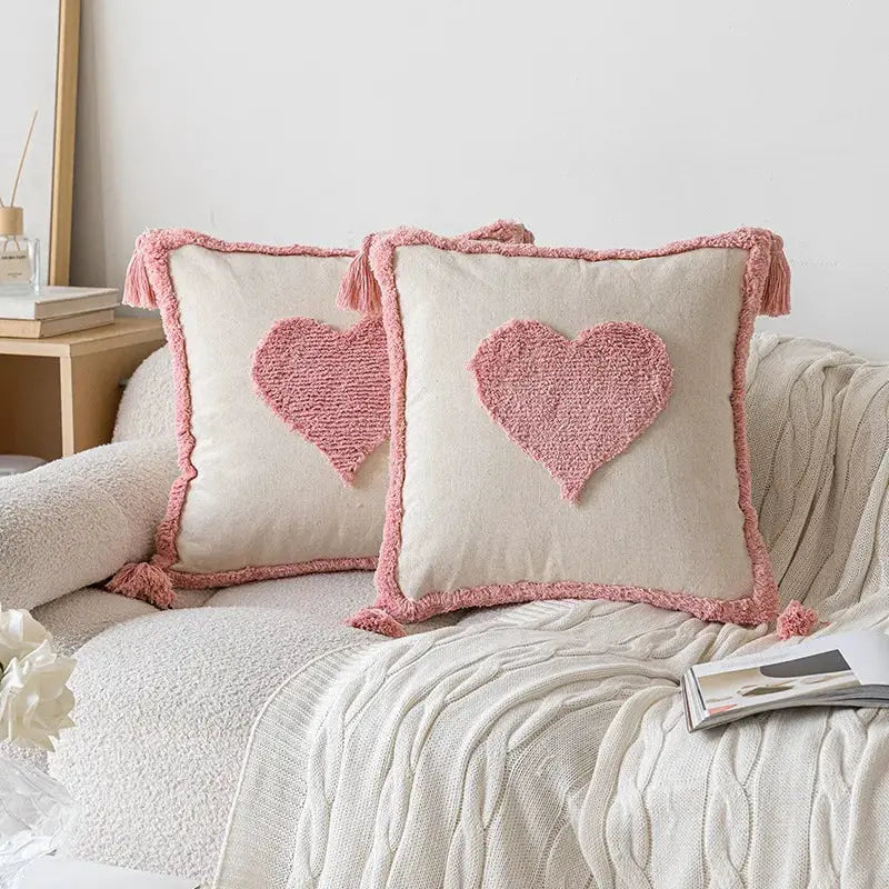 Pillow covers in pink cotton with heart tufting and tassel trim, set of 2 decorative sofa cushions