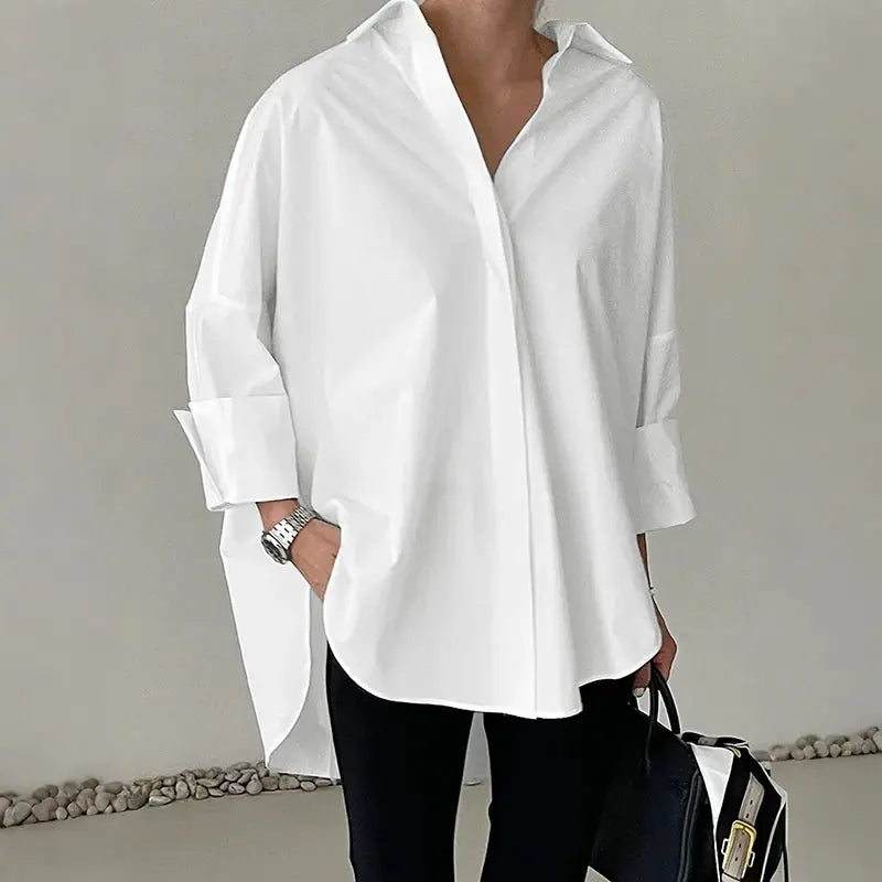 ZANZEA oversized white shirt blouse with turn-down collar, long sleeves, and high-low hem.