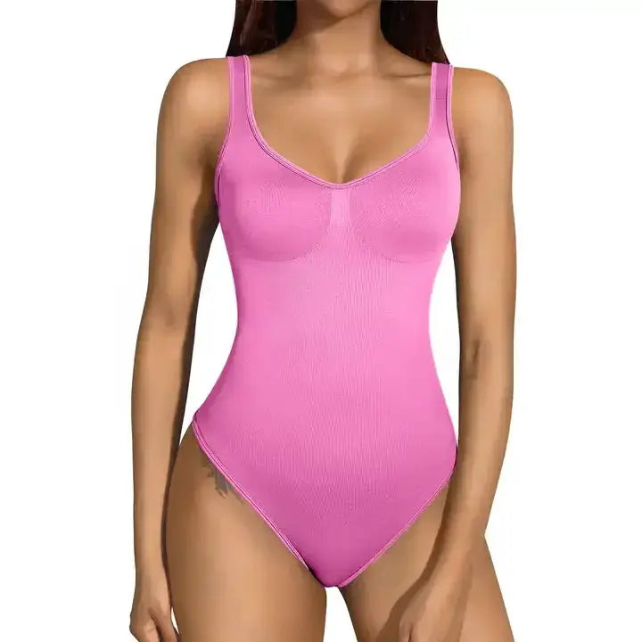 Pink seamless ribbed women's bodysuit with wide straps, casual vacation-ready style