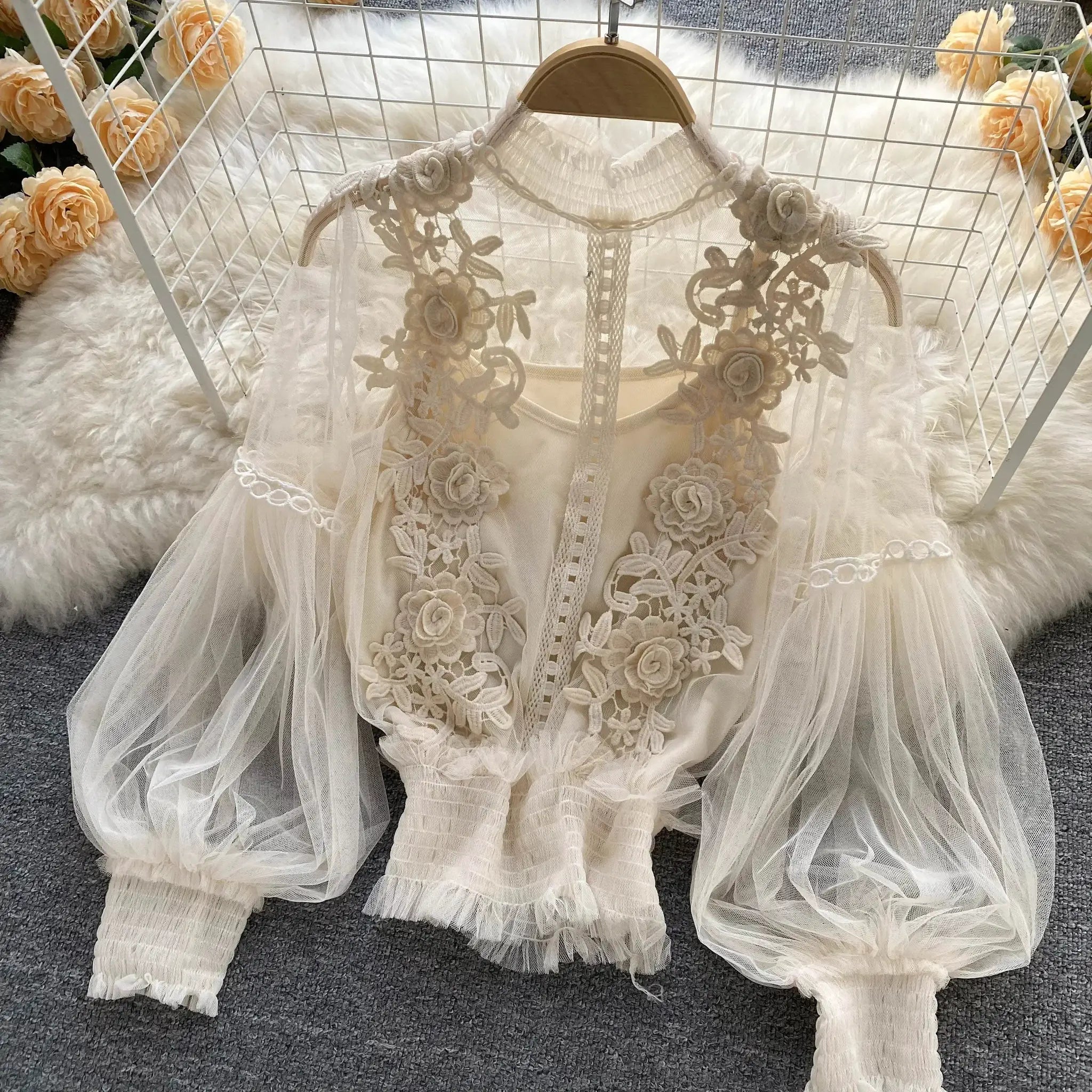 Ivory lace puff-sleeve blouse with floral appliqués on sheer tulle fabric