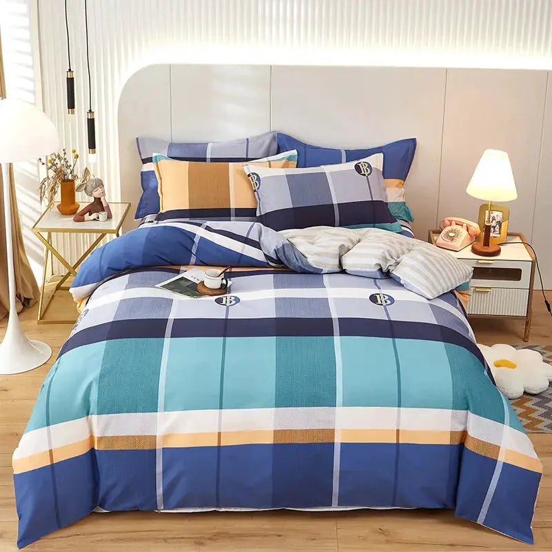 3-piece cotton duvet cover set with blue, teal and orange striped plaid; includes duvet cover and two pillowcases