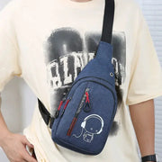 Simples Market blue chest bag with crossbody strap, denim-textured fabric and front zip pockets