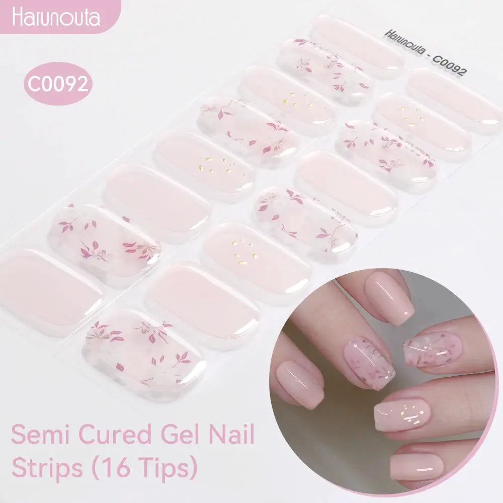 Gradient Auroras Semi-Cured Gel Nail Strips set, 16 tips with pink floral designs and gold accents by Harunouta