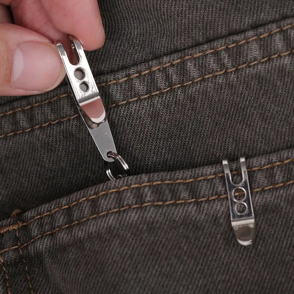 Two silver EDC pocket suspension clips with key carabiners on denim jeans
