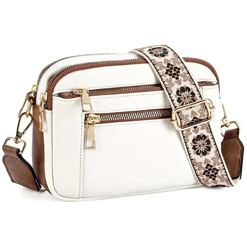 Crossbody bag, white square design with gold zippers and floral-patterned strap