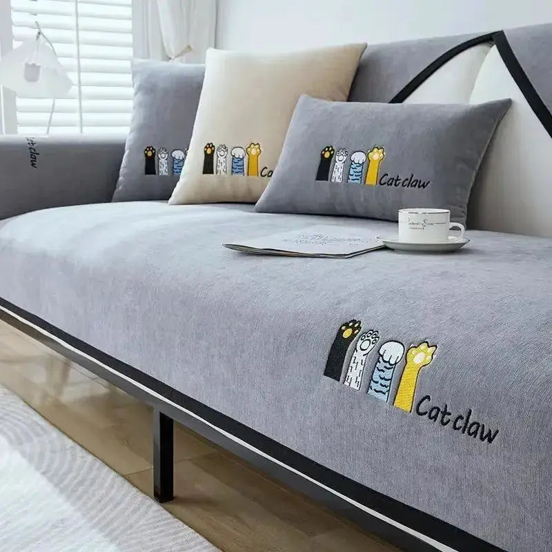 Sofa cushion covers in gray chenille with colorful cat paw embroidery and Cat claw text, non-slip