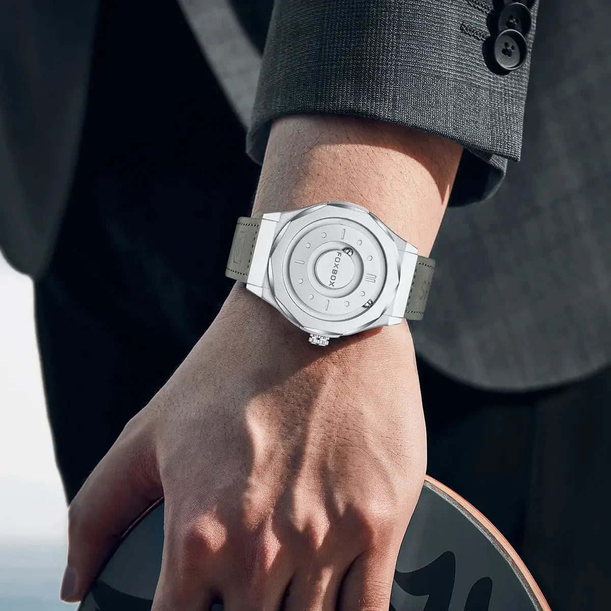 FOXBOX men's stainless steel quartz watch with gray strap on the wrist