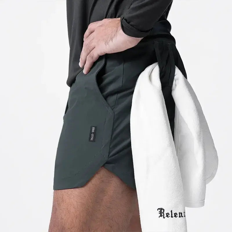ASRV men's quick-dry shorts in dark green, side view with visible ASRV tag