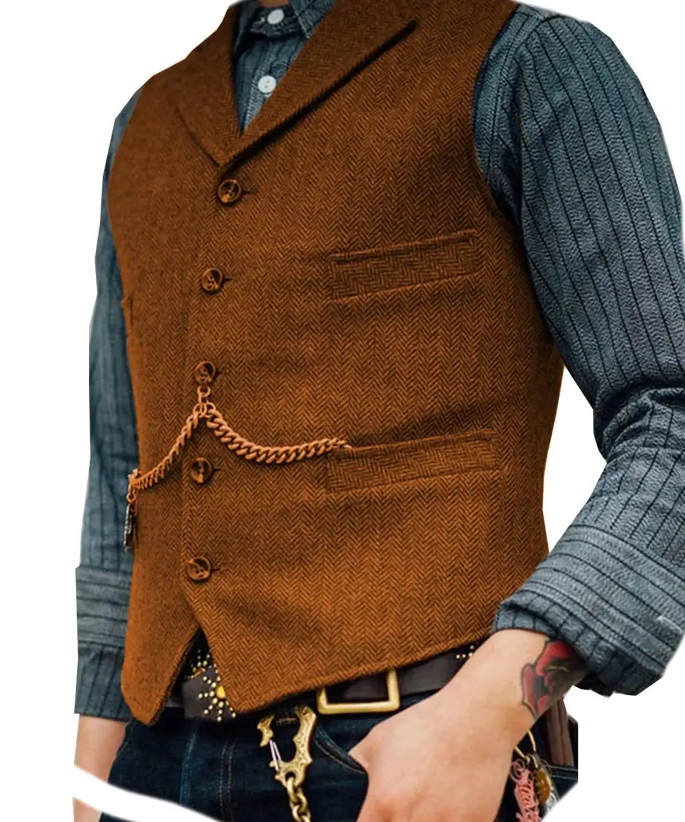 Brown wool tweed men's vest with lapel, sleeveless waistcoat, front button closure, chain detail over blue knit shirt.
