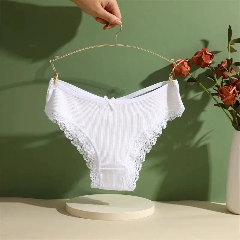 White cotton lace-trim Brazilian briefs on a hanger, mid-rise underwear