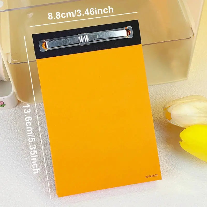Plande orange notepad, 75-sheet pocket memo book with PLNDE logo