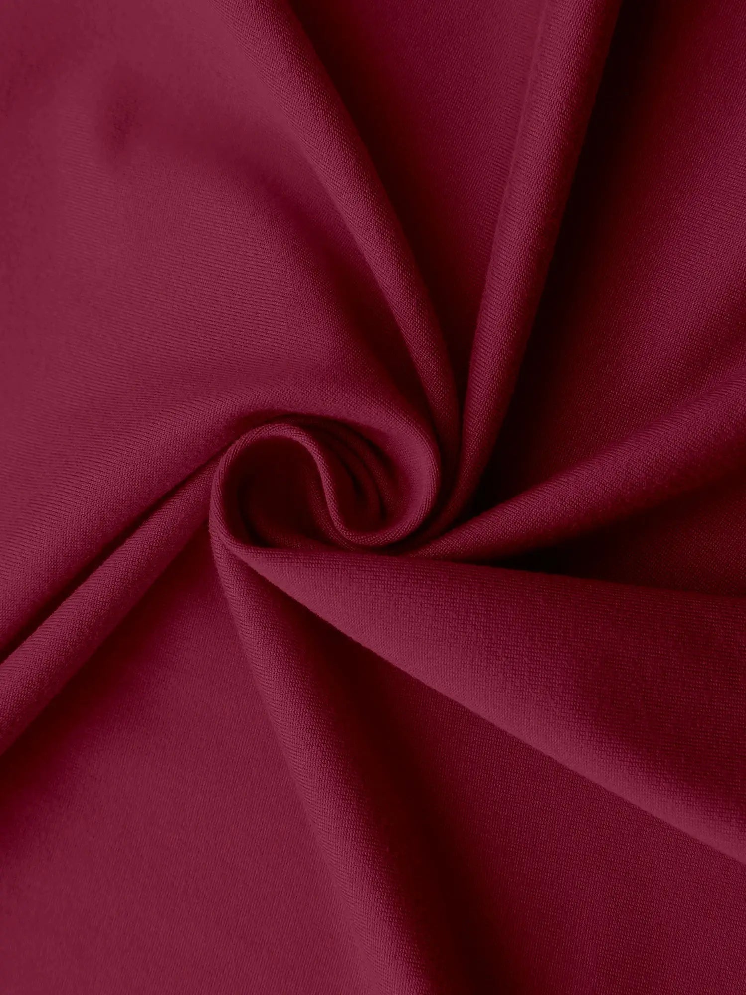 Skort fabric close-up in burgundy, showing soft textile texture
