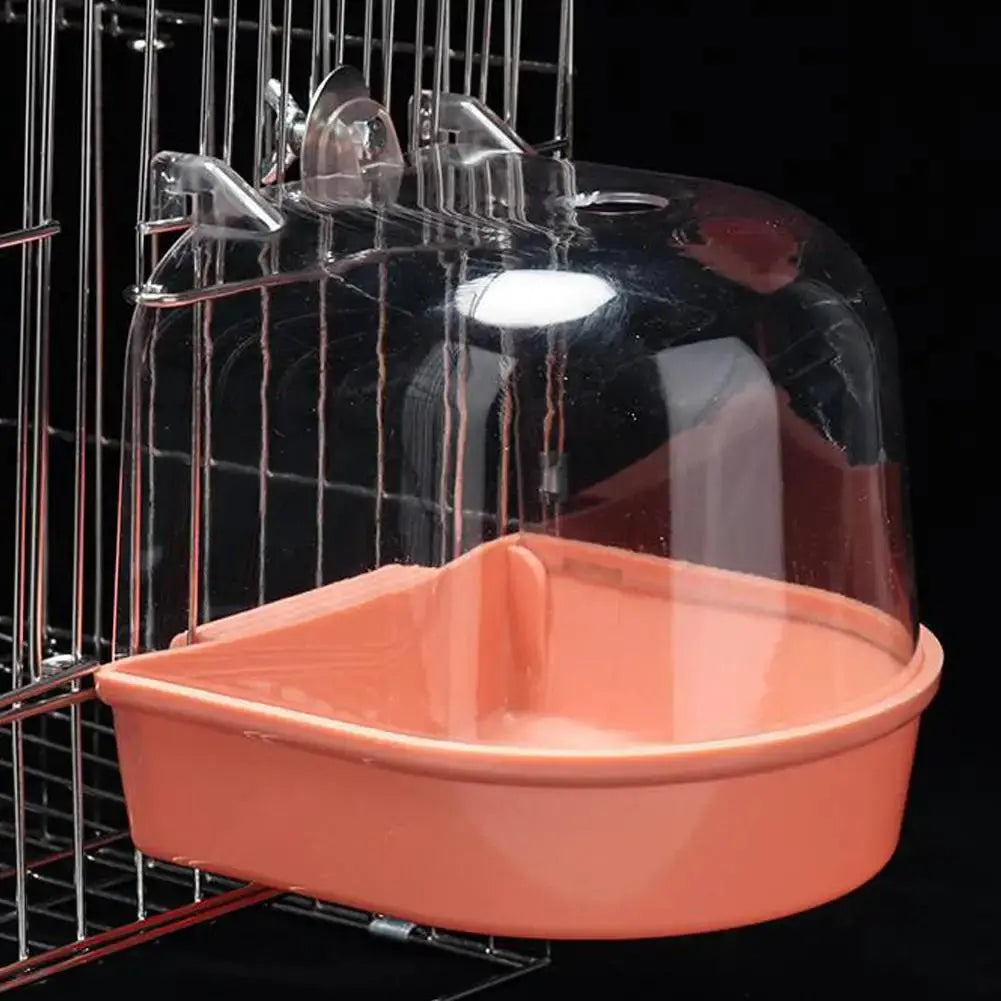 Hanging Bird Bath Cube by Simples Market; pink plastic tub with clear dome for small parrots and canaries
