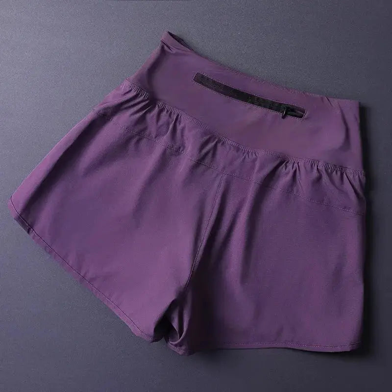 Women's purple 2-in-1 athletic shorts with back zip pocket; lightweight, breathable fabric