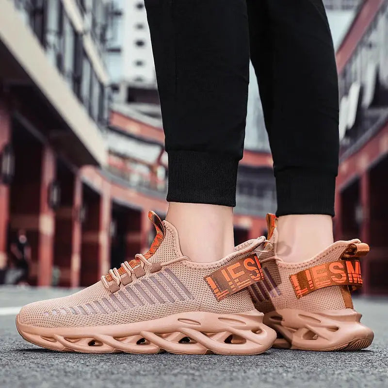 Unisex peach running sneakers with breathable knit upper and chunky sculpted sole, brand label on heel strap
