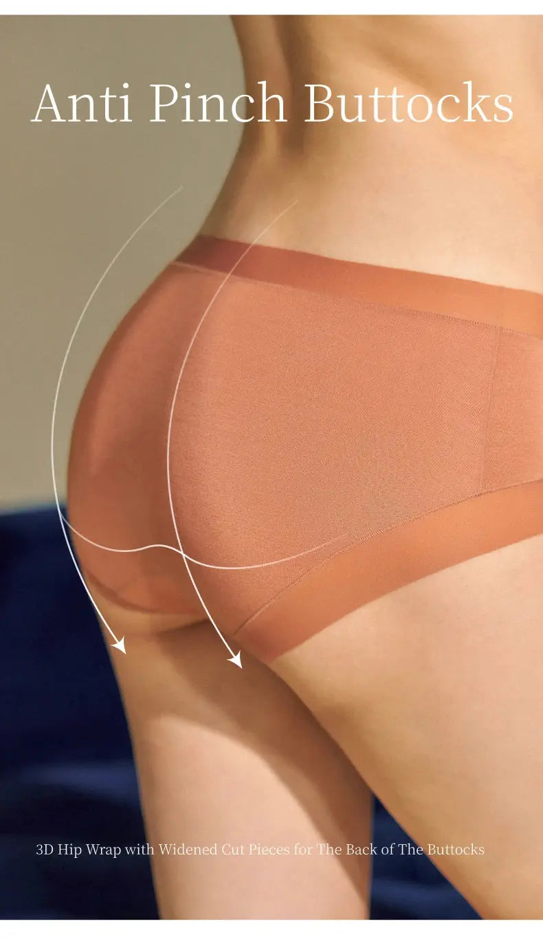 Seamless peach-toned women's underwear on hip, breathable stretch fabric.