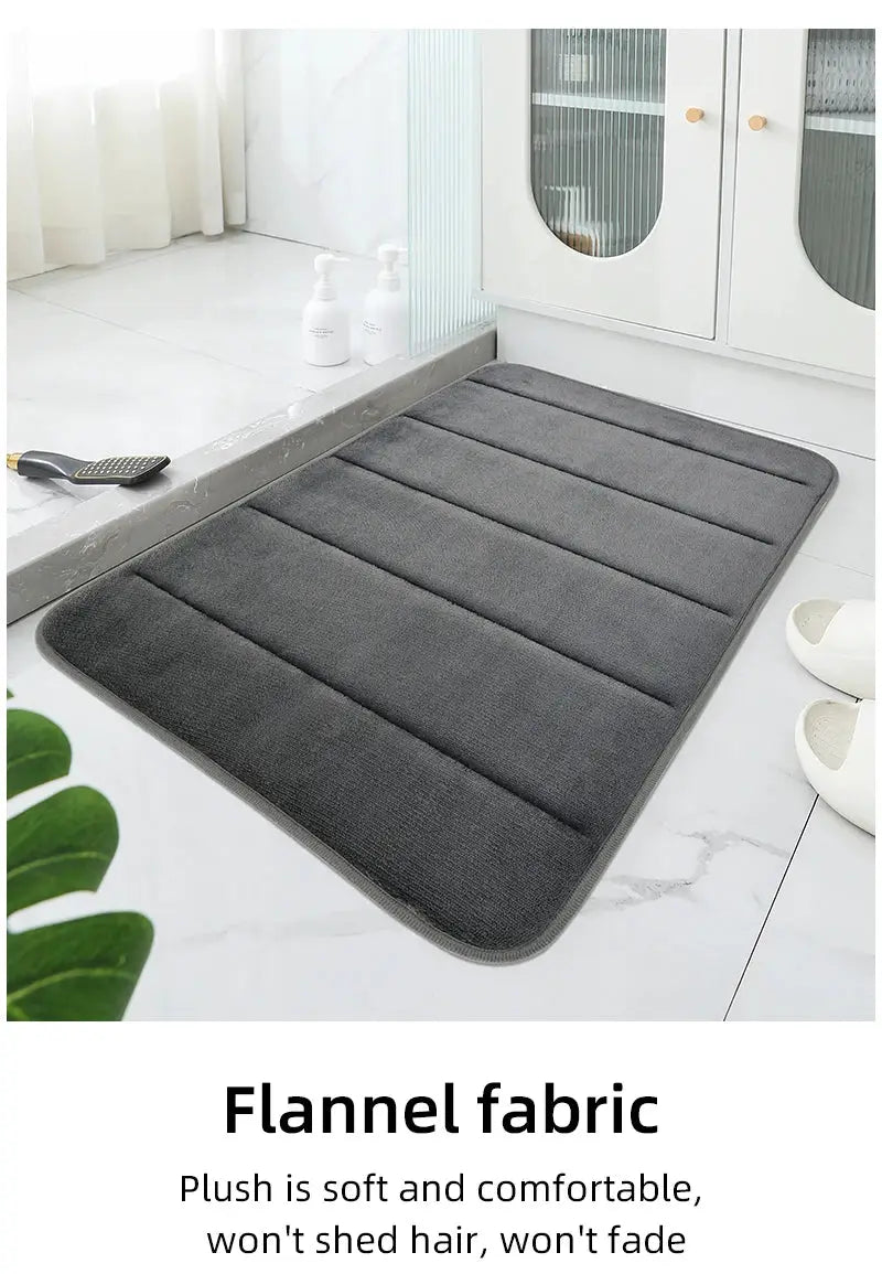 Bathroom mat, gray flannel fabric with quilted panels for soft comfort on tiled bathroom floors