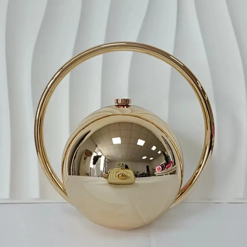Luxury ball-handle acrylic evening clutch with circular ring by Simples Market in gold