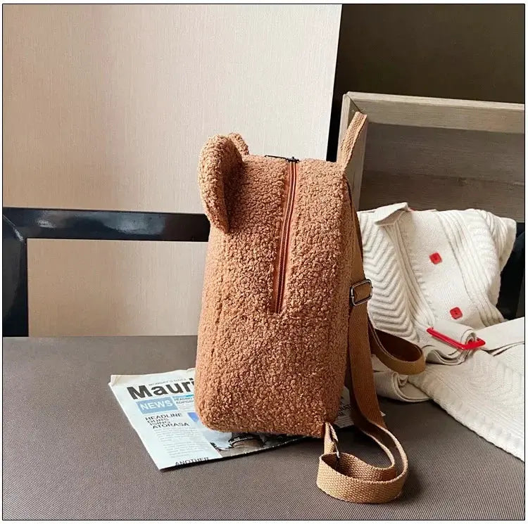 Cute bear-ear fleece backpack for kids by Simples Market; brown teddy-texture daypack with zipper and adjustable strap