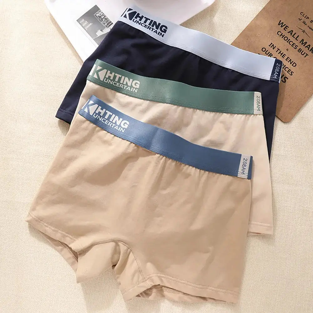 3-pack of 100% cotton breathable antibacterial women's panties with high-elastic waistbands in navy, green, and beige.
