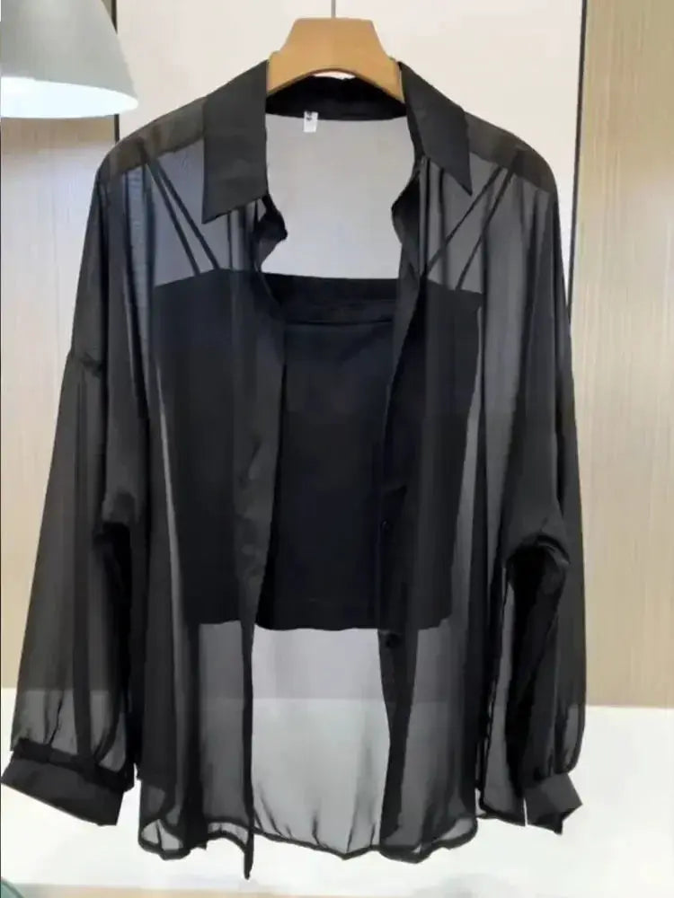 Plus-size Simples Market black ice silk sheer chiffon blouse with long sleeves and button-down front.