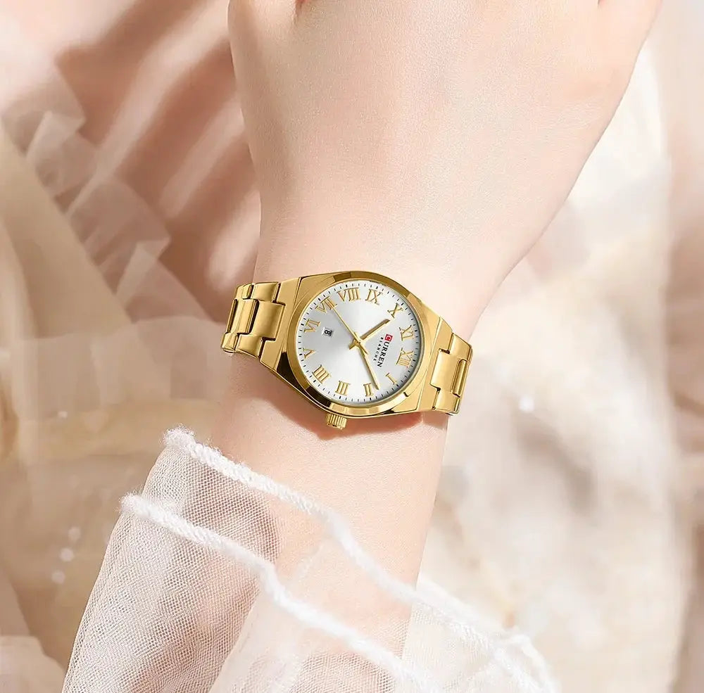 CURREN women's gold-tone stainless steel bracelet watch with Roman numerals and date