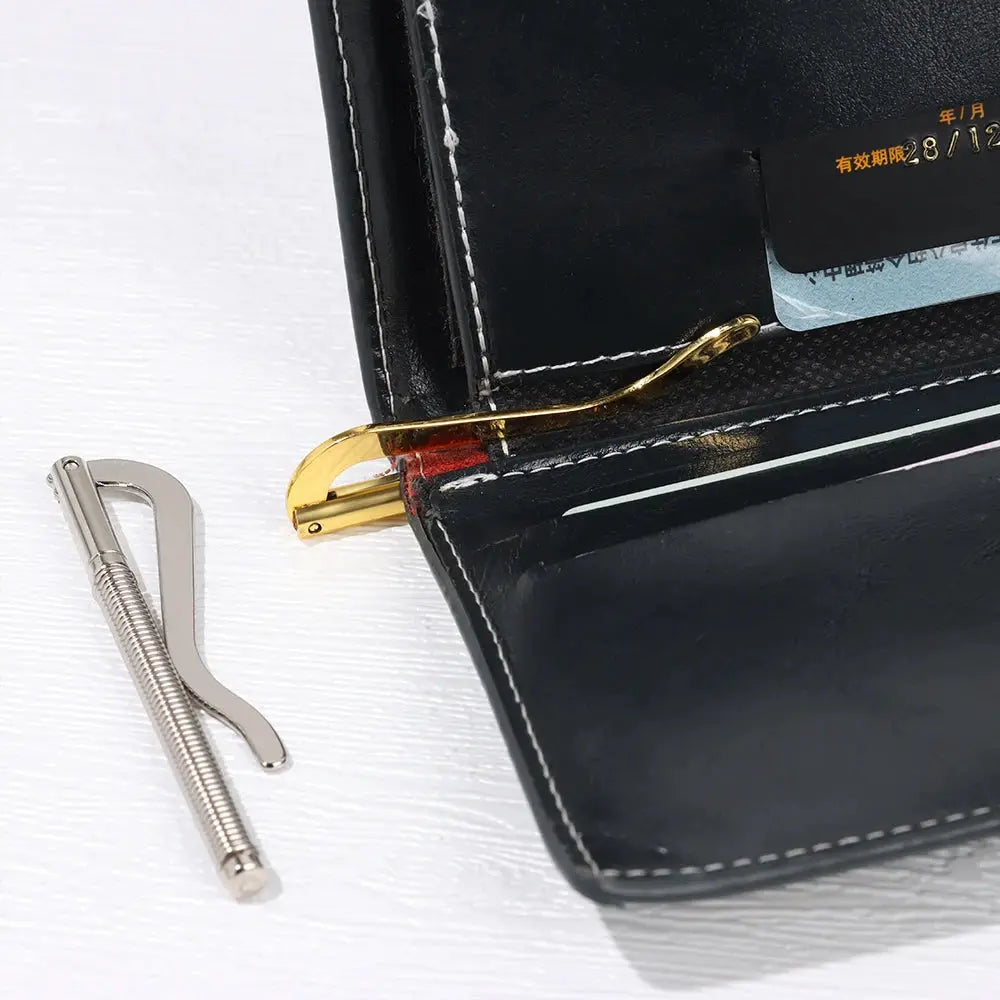 Bifold money-clip wallet in black leather with gold-tone clip
