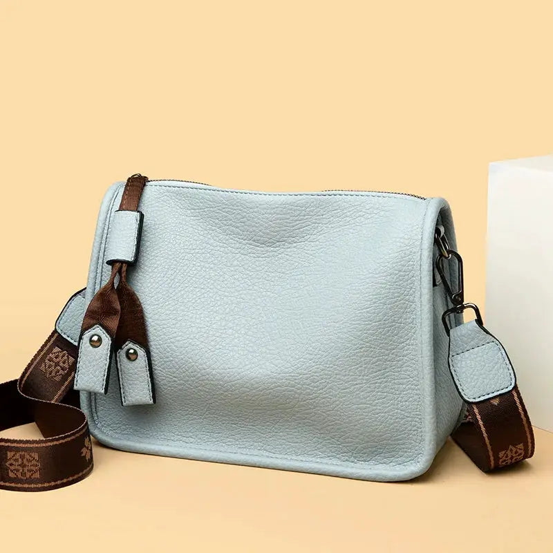 Simples Market light blue genuine leather tote bag with brown crossbody strap