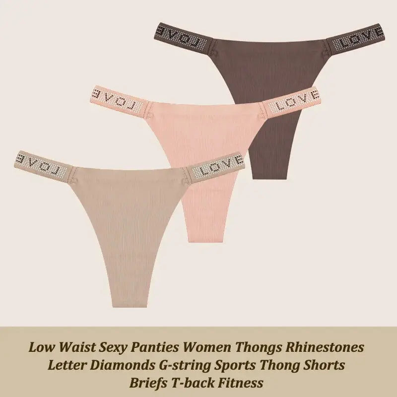 Set of three low-waist thong panties in beige, pink, and brown with rhinestone letter waistband