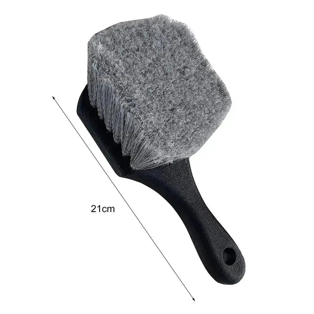 Car wheel cleaning brush with short black handle and gray bristles, 21 cm length